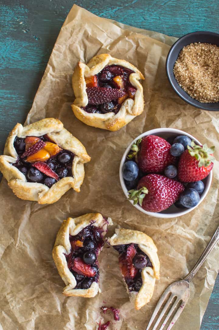 Mini Berry and Peach Galettes - the perfect summer treat! | healthynibblesandbist.com
