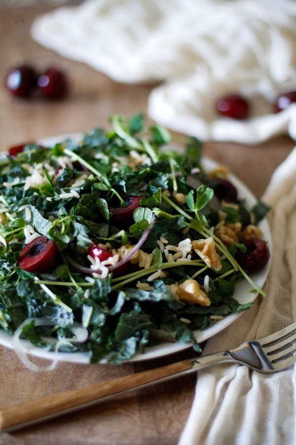 Cherry and Peashoot Kale Salad with Date Balsamic Vinaigrette | The Roasted Root