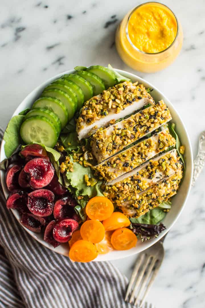 Pistachio Crusted Chicken Salad with Carrot Ginger Dressing - this gluten-free and paleo salad is perfect for weeknights. Ready in 30 minutes! | clube.futebolmilionario.com