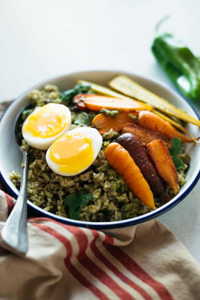 Rice Bowl with Green Chile Sauce, Roasted Carrots & Eggs - a hearty vegetarian fall meal by @healthynibs