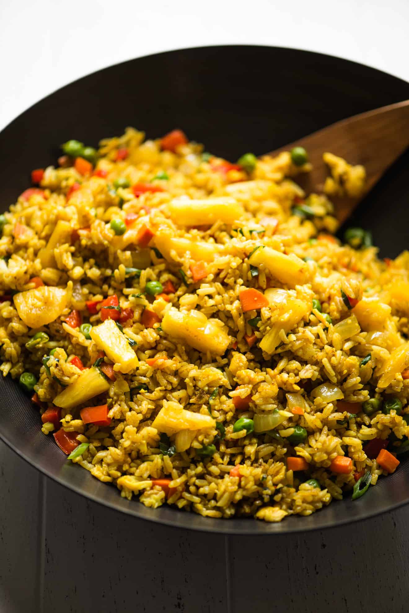HEALTHY Pineapple Fried Rice: easy dinner ready in 30 minutes! It's seasoned with turmeric, coriander and fresh pineapple!
