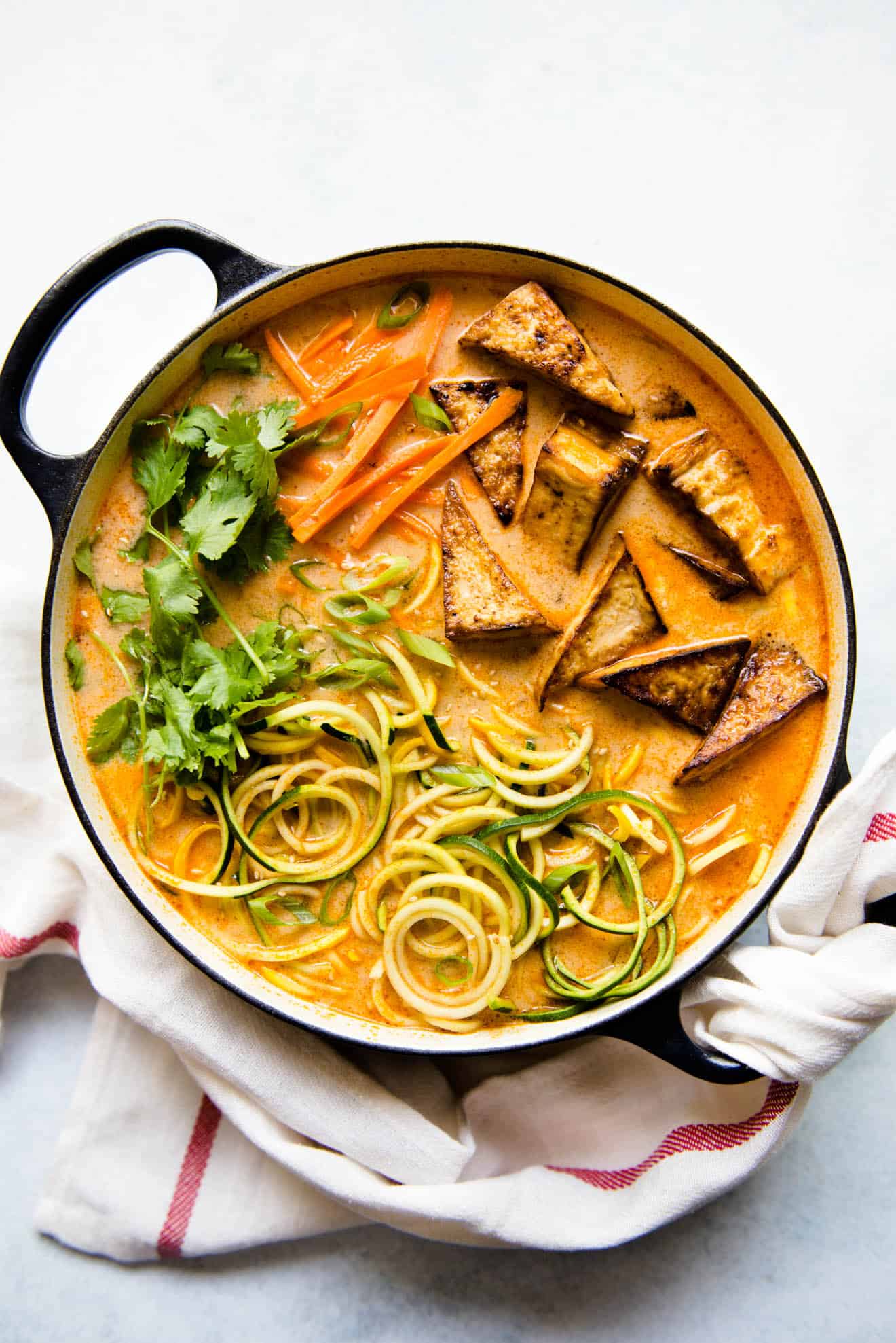Zucchini Noodles Tomato Coconut Broth and Pan-Seared Tofu - a delicious vegan meal for weeknights