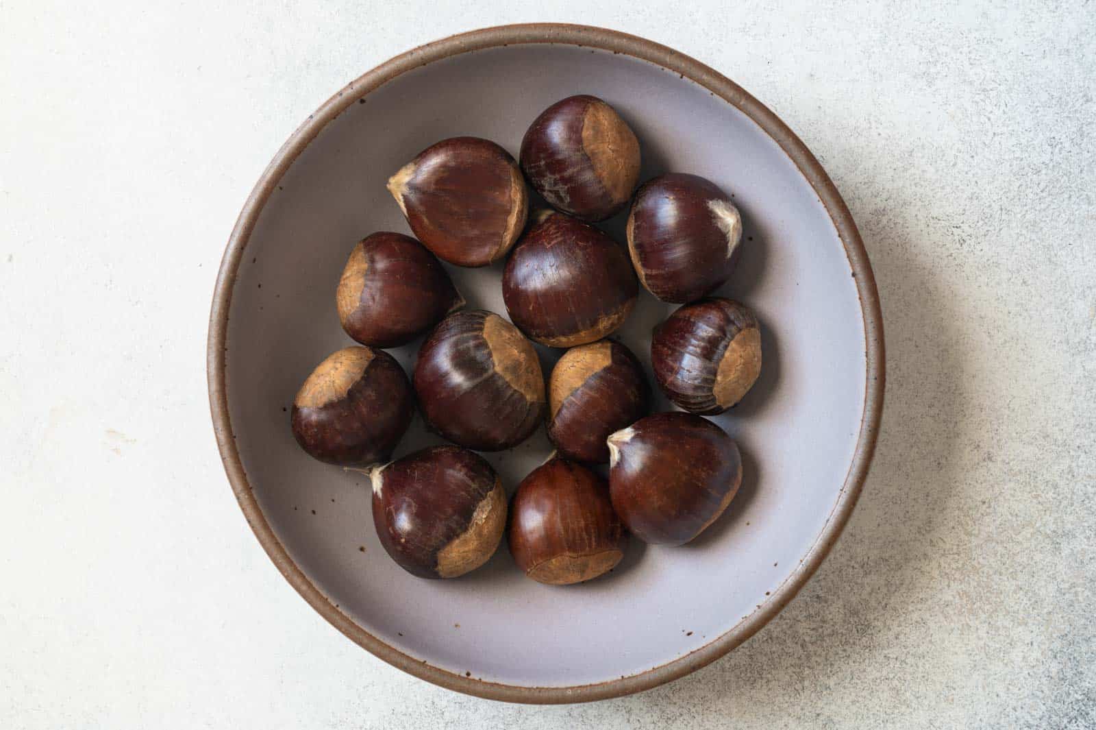 Chestnuts with shell in a bowl